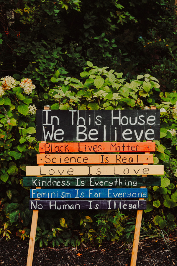 Positive signage expressing acceptance and love in Rego Park near CORE NYC apartments.